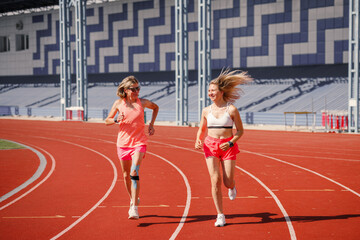 Women Running on Stadium Track Outdoors Fitness Training Healthy Lifestyle Sports Activity Summer