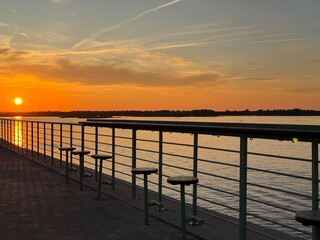 A Captivating and Beautiful Sunset Over Serenity Riverside Views and Stunning Reflections