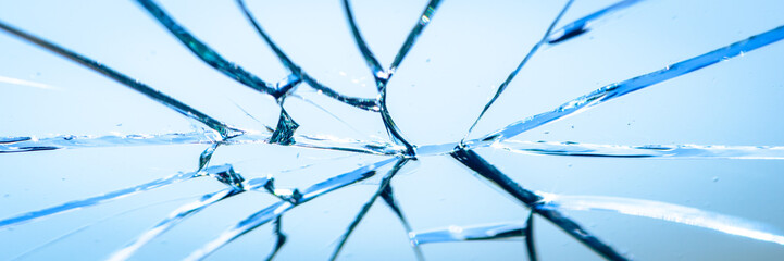 Close-up Of Cracked Glass On Vehicle Windscreen