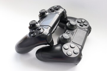 Two game joysticks close up, Modern black game controllers - ergonomic gaming accessories for...