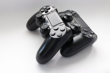Two game joysticks close up, Modern black game controllers - ergonomic gaming accessories for...