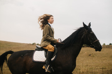 Young Woman Riding A Horse in Open Field and Enjoying Nature