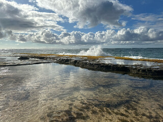 Waves Crash Over Reef
