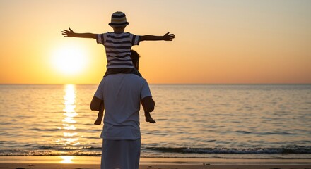 Father Carries Son on Shoulders at Golden Sunset Beach Arms Outstretched
