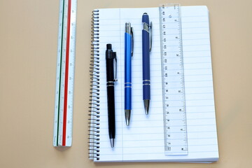 Pen and paper with ruler. Office supply concept. Ready to work.