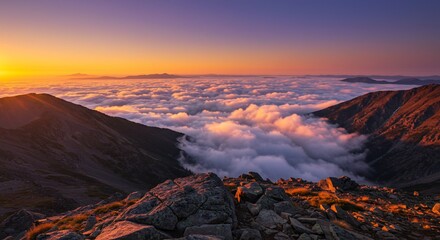 Fototapeta premium Golden Sunrise Over a Sea of Clouds from a Rocky Mountain Peak