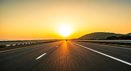 Fototapeta premium Highway at Sunset: A Golden Road to the Horizon Beckons with Speed and Adventure