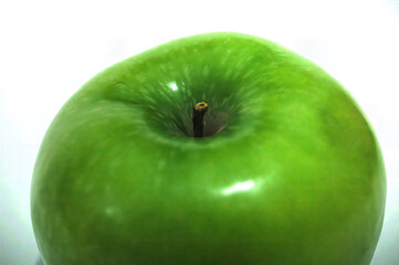 Fresh Green Apple Close-Up Against White Background