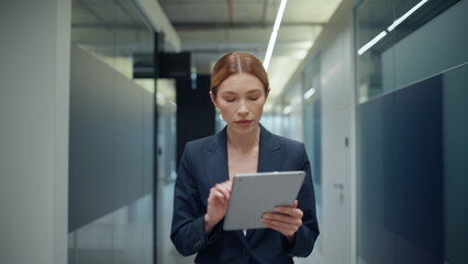 Woman making notes tablet on go closeup. Disappointed lady manager feeling mad