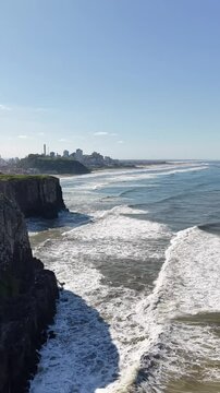 waves crashing on rocks