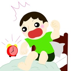 目覚まし時計の音で飛び起きる男の子
