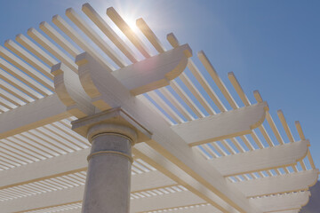 Detail Abstract of A Beautiful Marble and Wood Pergola Patio Cover.