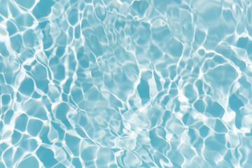 Blue water with ripples on the surface. Defocus blurred transparent blue colored clear calm water...