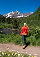 Blonde Athletic Woman Hiking by Mountain Creek in Colorado Wilderness &ndash; Outdoor Travel and Adventure Lifestyle