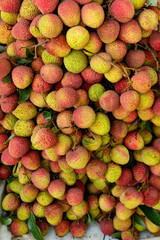 bunch of fresh lichees at vertical composition