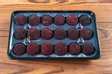 angle view fresh Chinese bayberries at horizontal composition