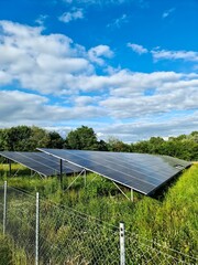 Solar panels providing sustainable energy under a cloudy sky