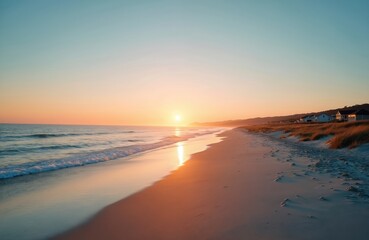 Fototapeta premium Tranquil sunset over ocean beach. Warm golden colors, calm waves reflect sunlight. Coastal houses on shore, picturesque nature scenery. Ideal for travel vacation, relaxation, peaceful moments.