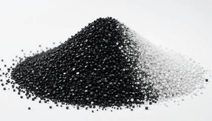 white-black plastic masterbatch granules, arranged in mounds, isolated on white background