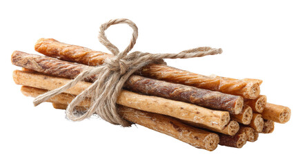 A bundle of delicious dog chews tied with twine on a white isolate background.