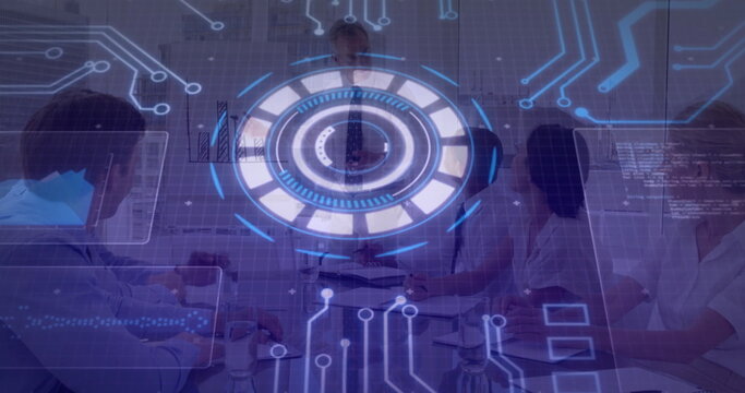 Presenting business executive pointing at holographic interface above conference table with laptops