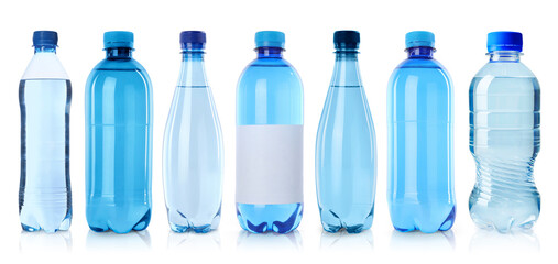 Naklejka premium Plastic bottles with water on white background, set