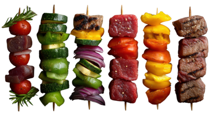 Colorful skewers of meat and vegetables ready for grilling on a white background.