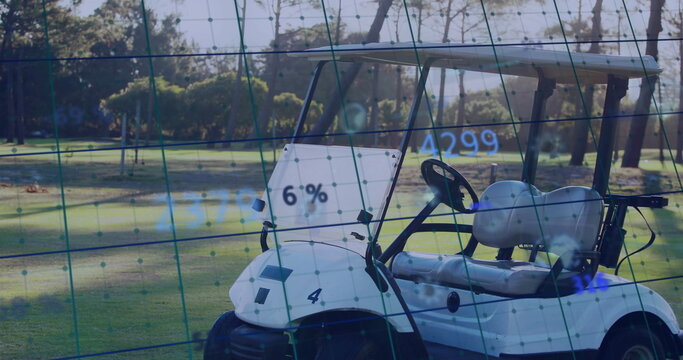 Showing golf cart sitting on fairway with green safety net and digital grid with data points