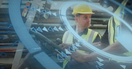 Industrial workers wearing vests and hard hats handling controls in facility, with joystick, AR