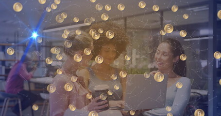 Collaborating three women reviewing crypto trends on laptop in modern workspace, Bitcoin overlay