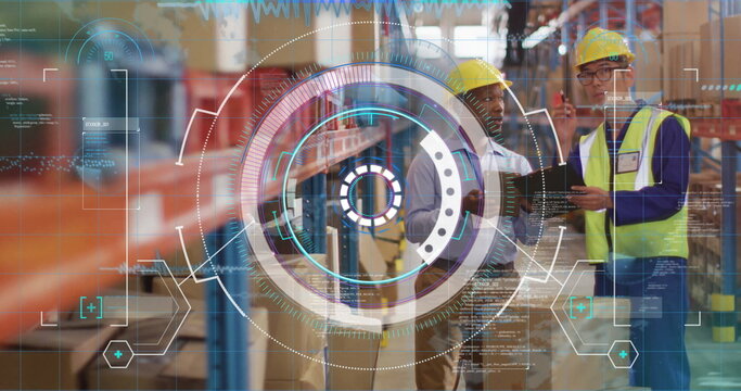 Checking inventory two workers in yellow hard hats using tablet on warehouse racks, copy space