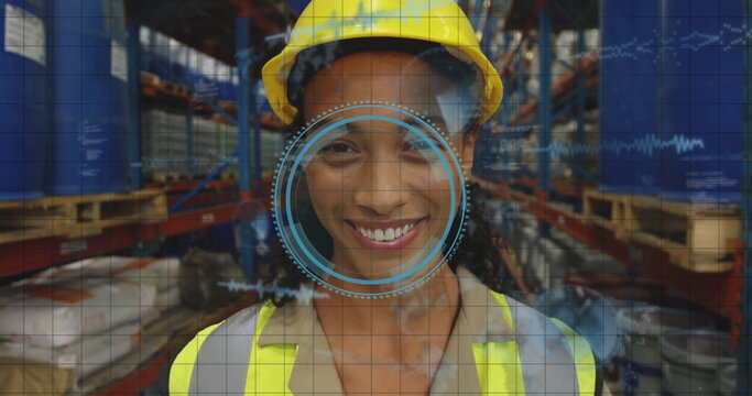 standing warehouse worker wearing hard hat and safety vest in warehouse aisle, with HUD overlay