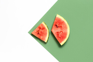 Pieces of fresh watermelon on colorful background