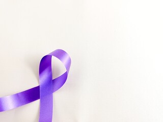 Purple awareness ribbon on a clean white background, symbolizing various causes and support