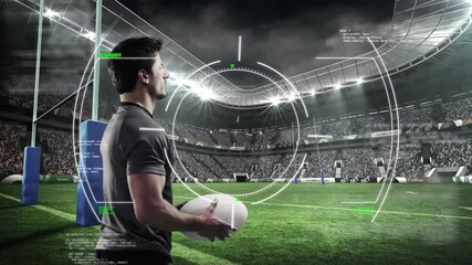 Male athlete activating sports HUD while rotating rugby ball and analyzing trajectory for kick - Powered by Adobe