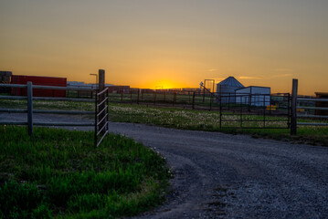 Longview, Alberta - June 8, 2025: Out buildings and landscapes on the Tongue Creek Ranch at sunset 