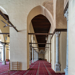 The Al-Zahir Baybars Mosque in Cairo stands as a testament to Egypt's profound Islamic heritage, renowned for its imposing columns, arched passages, and meticulously adorned prayer carpet