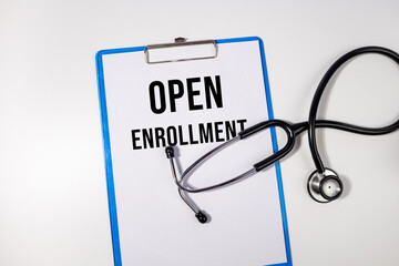Open Enrollment Reminder on Medical Clipboard with Stethoscope – Healthcare Access Concept