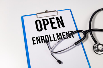 Open Enrollment Reminder on Medical Clipboard with Stethoscope – Healthcare Access Concept