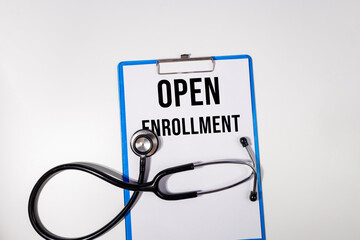 Open Enrollment Reminder on Medical Clipboard with Stethoscope – Healthcare Access Concept