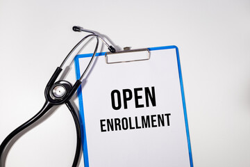 Open Enrollment Reminder on Medical Clipboard with Stethoscope – Healthcare Access Concept