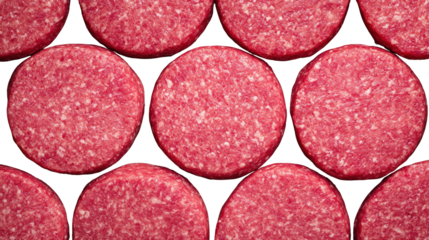 Close-up of raw hamburger patties arranged in a neat pattern on a dark surface.