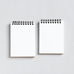 Two Blank Spiral Notebooks Mockup on Gray Background