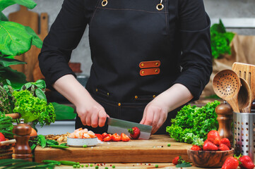 Cooking fresh vegetables and fruits with care in a vibrant kitchen by a passionate vegan chef