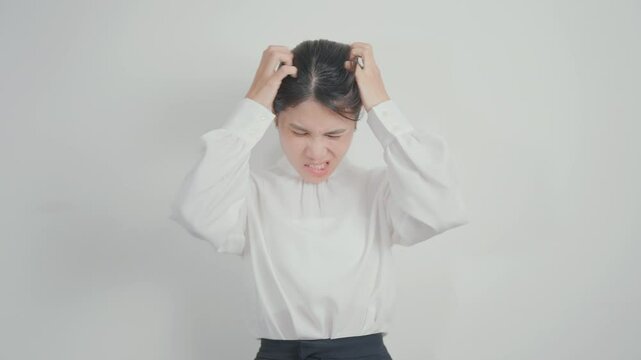 Business woman having itchy Scalp and Head hair, Dandruff, Dry Scalp, Skin Allergy Seborrheic dermatitis. Dermatology, Leprosy day, Systemic lupus erythematosus, SLE, Psoriasis and Atopic Eczema rash