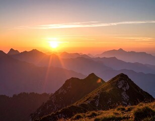 Obraz premium Mountain sunrise over peaks with warm colors lighting the sky
