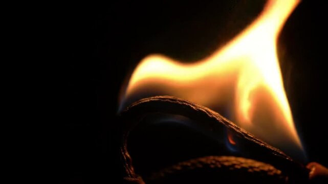 A lit fuse sparking and burning quickly along its length, symbolizing imminent danger.