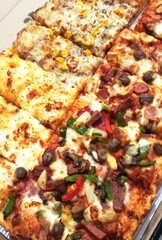 Assorted Pizza Slices in a Box