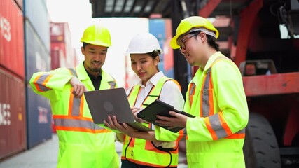 group of Diversity Engineers japan Foremen and asian Supervisors woman using laptop computer inspection Inventory in Shipping Cargo Container Terminal Depot teamwork talk logistics - Powered by Adobe