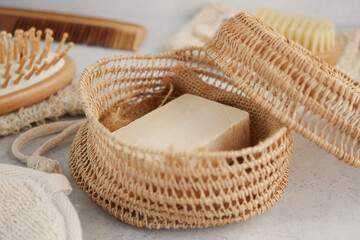 Artisan woven basket containing natural soap on a countertop